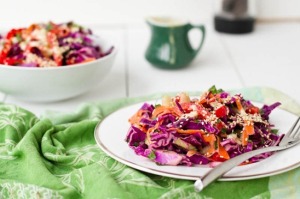 Image: Rainbow Cabbage Salad topped with hemp seeds from Oh She Glows